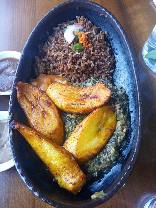 Mboga - Creamed spinach, stewed yellow beans, spiced rice pilaf, and plantains. at Baobab Fare in Detroit