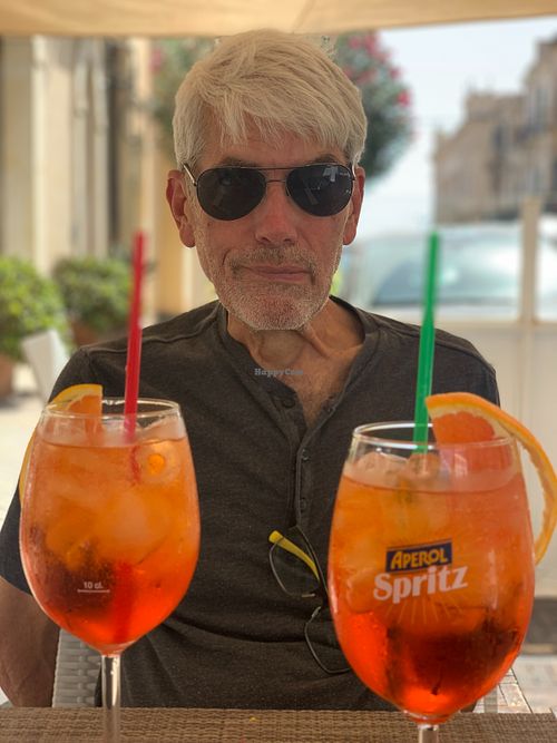 Aperol Spritz is refreshing and typically a drink to stimulate your hunger. And it's vegan!  at NICK HOUSE in Syracusa