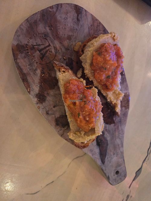 White bean bruschetta no cheese at Vino Loco Wine and Tapas Bar in Englewood