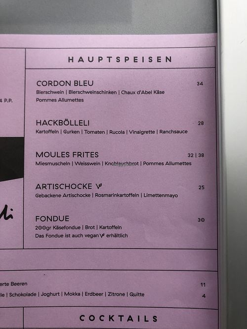 Main dishes, including vegan cheese fondue at Klingeli in Basel