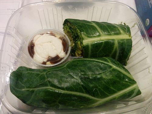 Delicious collards wrapping pesto, sprout, veggie filling. at Christopher's Kitchen in Palm Beach Gardens