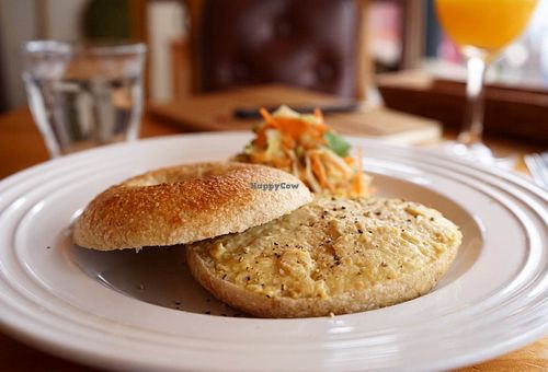 Bagel with hummus and daily deli special.  at Cafe Atl in Osaka