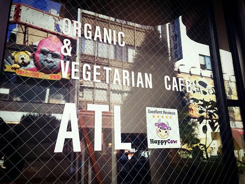 Found a Happy Cow decal!! at Cafe Atl in Osaka