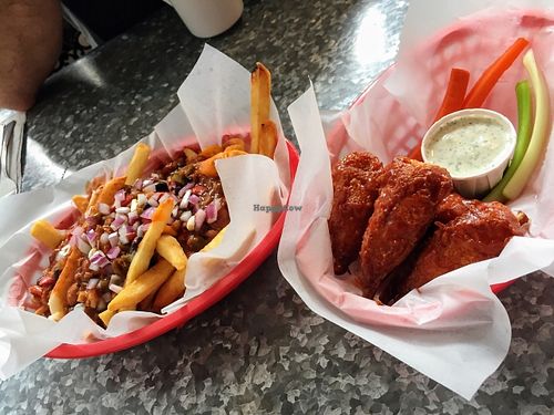 Vegan chili fries and BBQ wings.  at Downbeat Diner and Lounge in Honolulu