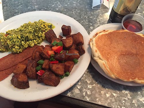 pesto tofu scramble, vegan bacon, home fries, and pancakes - all for $10! at Downbeat Diner and Lounge in Honolulu