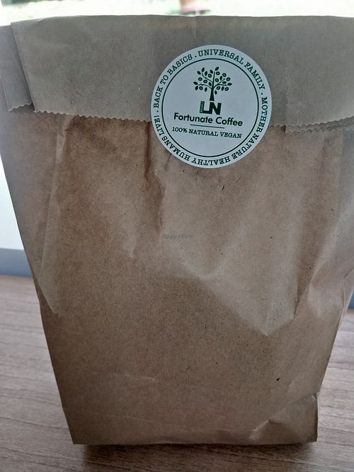Bread in takeaway paper bag at Loving Nature Fortunate Coffee Cafe in Central Singapore