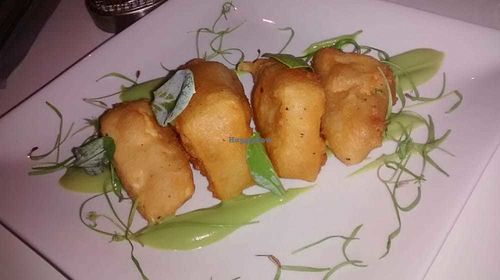 Battered tofu with chips, pea emulsion, and lemon curd at 1847 in Manchester