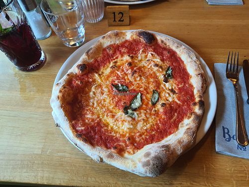 Delicious Pizza Neapolitana with vegan cheese at Bottega No. 13 in Neustift Im Stubaital