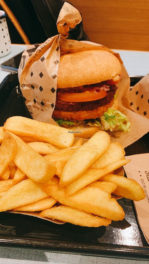 burger with rösti and fries  at Swing Kitchen - Universitätsring in Vienna