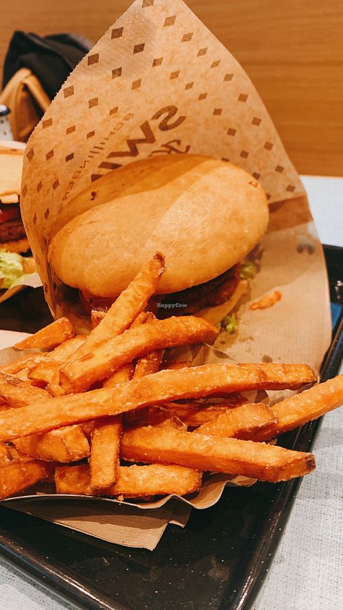 burger with rösti and sweet potato fries  at Swing Kitchen - Universitätsring in Vienna