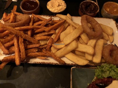 Plate of different fries  at Peter Pane in Cologne