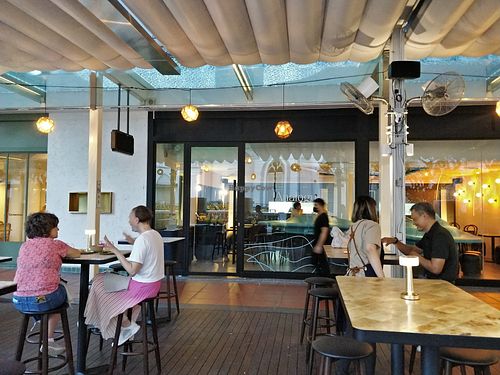 Restaurant exterior dining area at Analogue Initiative in Central Singapore