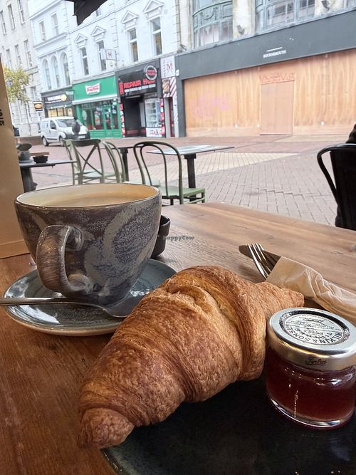 Croissant and coffeee  at Esquires Coffee in Bournemouth