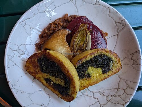 Potato and spinach roulade with lentils at Café Derbl in Hallstatt