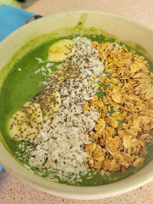 Green kale smoothie bowl with avocado at Crisp in Roatan