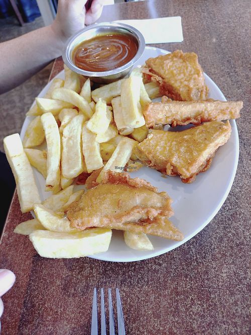 Tofish and chips with curry sauce at Papa's Fish and Chips in Cleethorpes