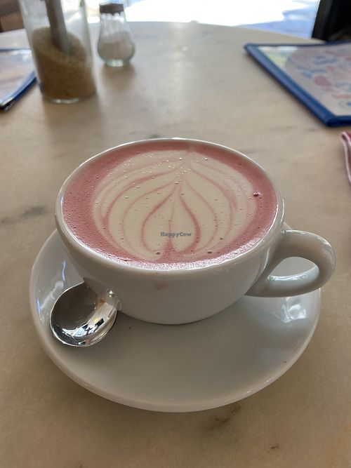 Pink latte with oat milk at Dear Breakfast in Lisbon