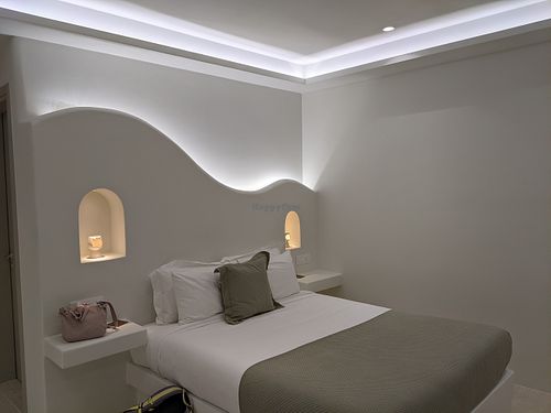 Romantic, calming Beta Suite bed in the evening at Mod Santorini in Santorini