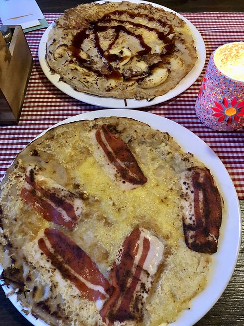 Under: Vegan bacon/cheese, above vegan duo, partly apple and the other half bacon/cheese with already syrup on it.  at Pannekoekhuis De Nachtegaal in Rotterdam