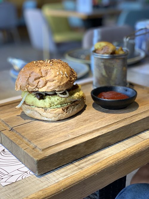 Vegan Burger with Potato Wedges  at Flavors Cafe in Doha
