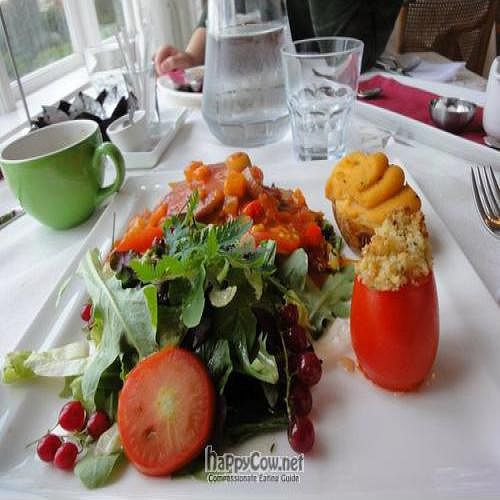 homemade veggie burger, cheesy potato, salad.  tomatoes were fresh from the garden! at Lindin in Laugarvatn