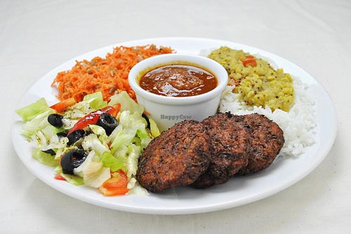 Kofta set: Carrots-cabagge cutlets (3 pcs), Tomato sauce, Basmati rice, raw veggie salad.  at Najadacze.pl - Vege Kuchnia Swiata in Wroclaw