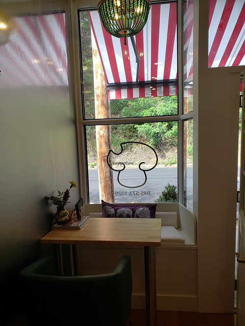 Front window seating nook at Secret Vegan Cafe in Kingston