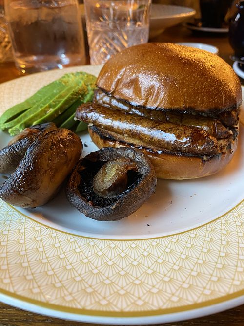 Sausage bapson a tinkers treat for Sonny boy Jimson   at The Cosy Club in Durham