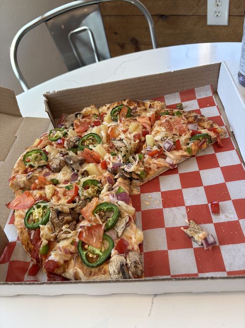 Island Pizza with vegan cheese option. Delicious.  at Boardwalk Bakery and Pizzeria in Terlingua
