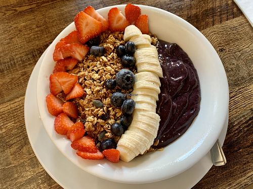 Açai bowl with coconut milk at The 1955 Club in Walton On Thames