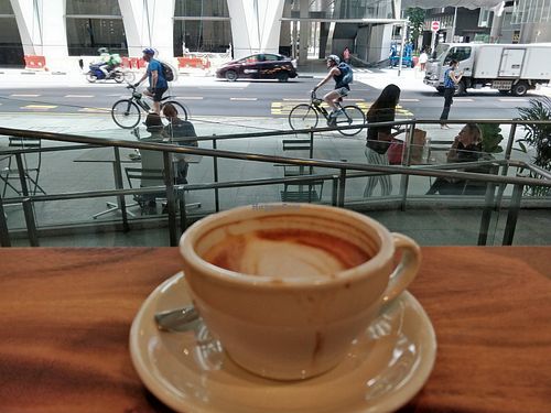 Enjoy a cuppa while watching the city view at The Whole Kitchen - Robinson Rd in Central Singapore