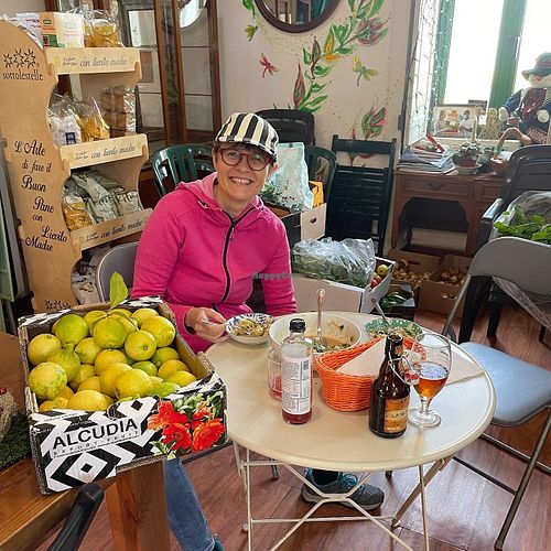 sitting in the shop  at Tienda Sana La Huerta de May Restaurante in Gran Canaria
