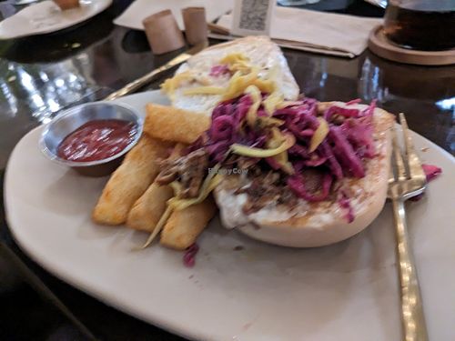 Grand Puebla open face with yucca fries at Mantra Kitchen in Houston