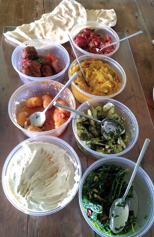 Wonderfully smooth hummus, falafel, several eggplant dishes, spinach, Greek bean salad, artichokes and Lebanese bread at Vega Paradijs in Hilversum