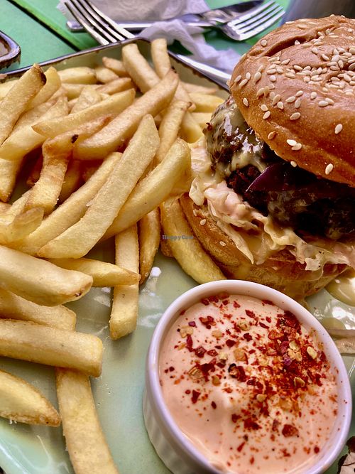 Vegan cheese burger with fries and vegan chilli mayo  at Prinz Bar in Tbilisi