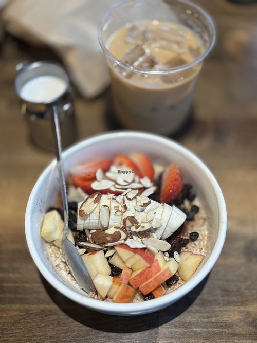 Loaded oatmeal and a latte with oat milk   at Deep Creek Coffee Company in Springdale