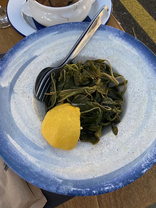 Dark leafy greens with lemon  at Mouragio in Paros