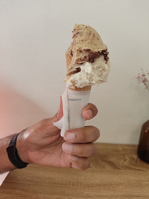 Small cone with coffee and salted cashew ice cream at Imaginarni Zmrzlina in Prague