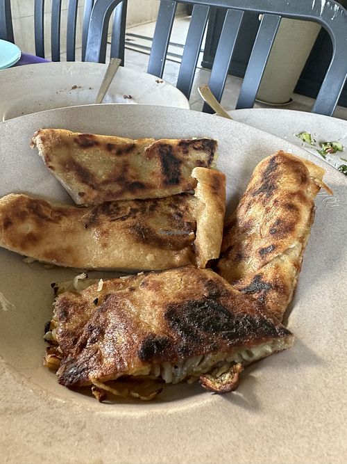 Fried flat bread with potato filling   at Nasiba in Buqata