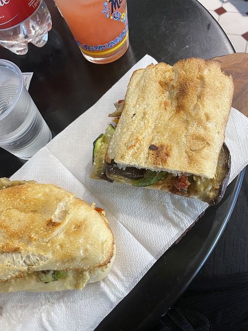 Grilled veggies, hummus, dry tomatoes and chooped almonds sandwich  at Bono Bottega Nostrana in Rome