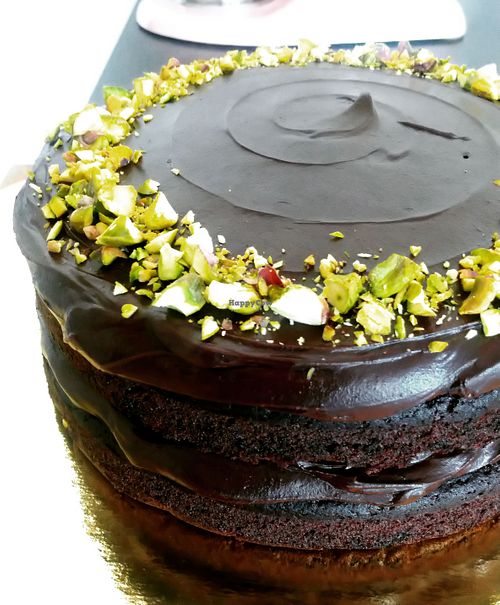Torta al doppio cioccolato con granella di pistacchi  at Crave Food Bakery  in Udine
