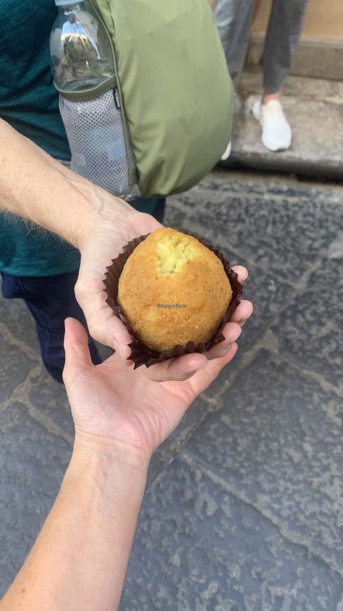 Arancina - one bite missing 🙊  at Vegan Food Tour in Cefalu