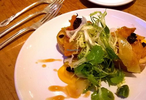 1st course: Crostone of Squash.
This included the vegetable three ways in one dish -- squash ribbons, roasted squash, and a silky puree. 

(Part of the amazing 'chef's table' 4-course meal which actually included 7 plates and tastes.) at Natural Selection in Portland