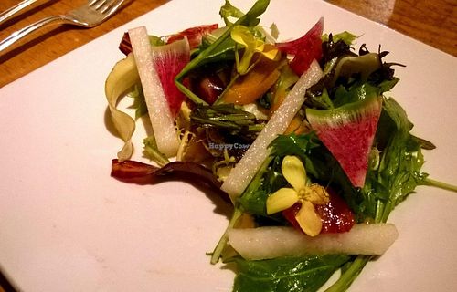 2nd course: Endive, Treviso & Cara Cara Salad.
This featured unexpected and delicious mustard flower blossoms, and watermelon radishes.

Part of the amazing 'chef's table' 4-course meal which actually included 7 plates and tastes.) at Natural Selection in Portland