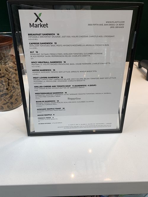Menu for deli inside store at XMarket in San Diego