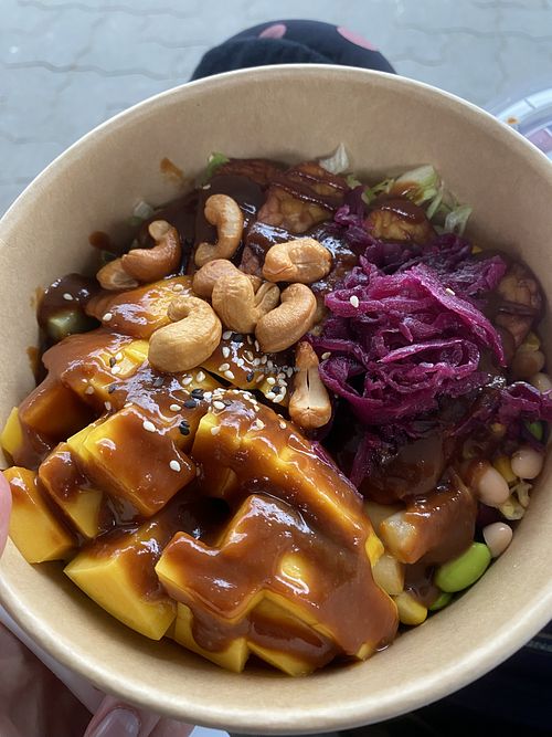 Poké bowl with added mango  at Tozi in Vienna