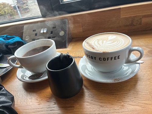 Large oat dirty chai and also coffee w oat milk   at Crosby Coffee in Liverpool