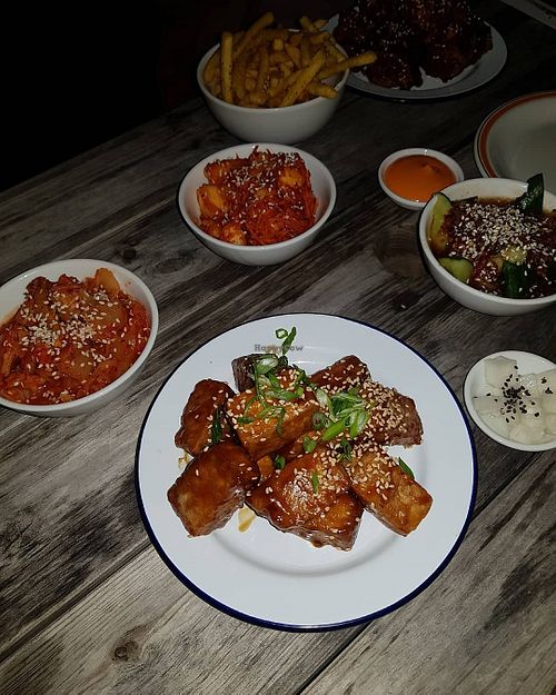 The Jjang fu with kimchi, pineapple kimchi, smashed cucumber, and fries with vegan mayo at Rose in June in Margate