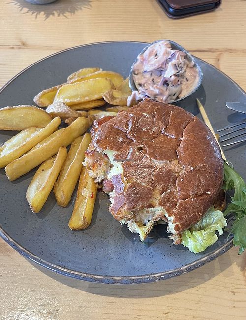absolutely gorgeous vegan jackfruit burger with a side of slaw and fries, never had such a nice vegan burger & staff were lovely!!  at The Windjammer Cafe & Bar in Falmouth