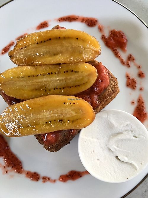 French toast with peanut butter, strawberry jam, whipped coconut cream and caramelized bananas. at Lucuma Vegan Cafe in Colombo